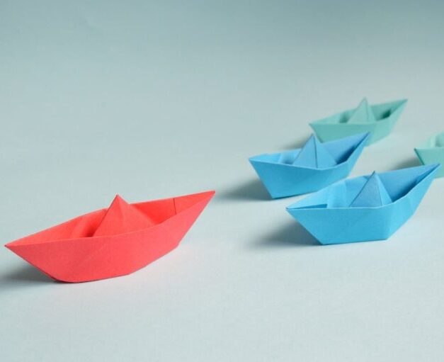 Paper Boats on Solid Surface